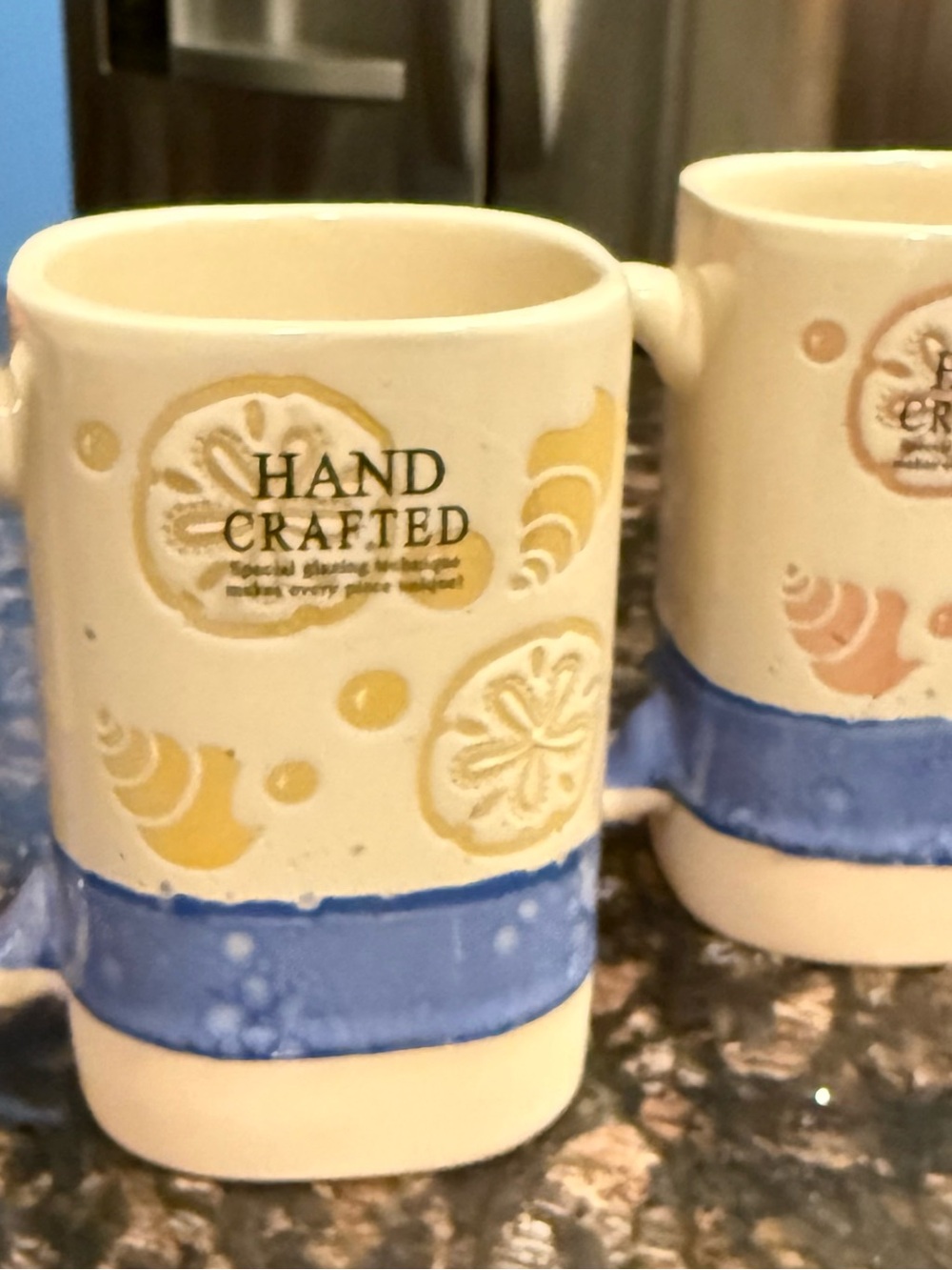 Hand Crafted Ceramic Mug in Cream with Blue Band and Yellow Shell Motifs NEW